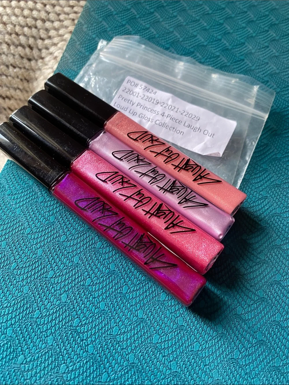 Loud Lip Gloss Collection - 4-Piece Set (Pink, Purple, Peach, Magenta)